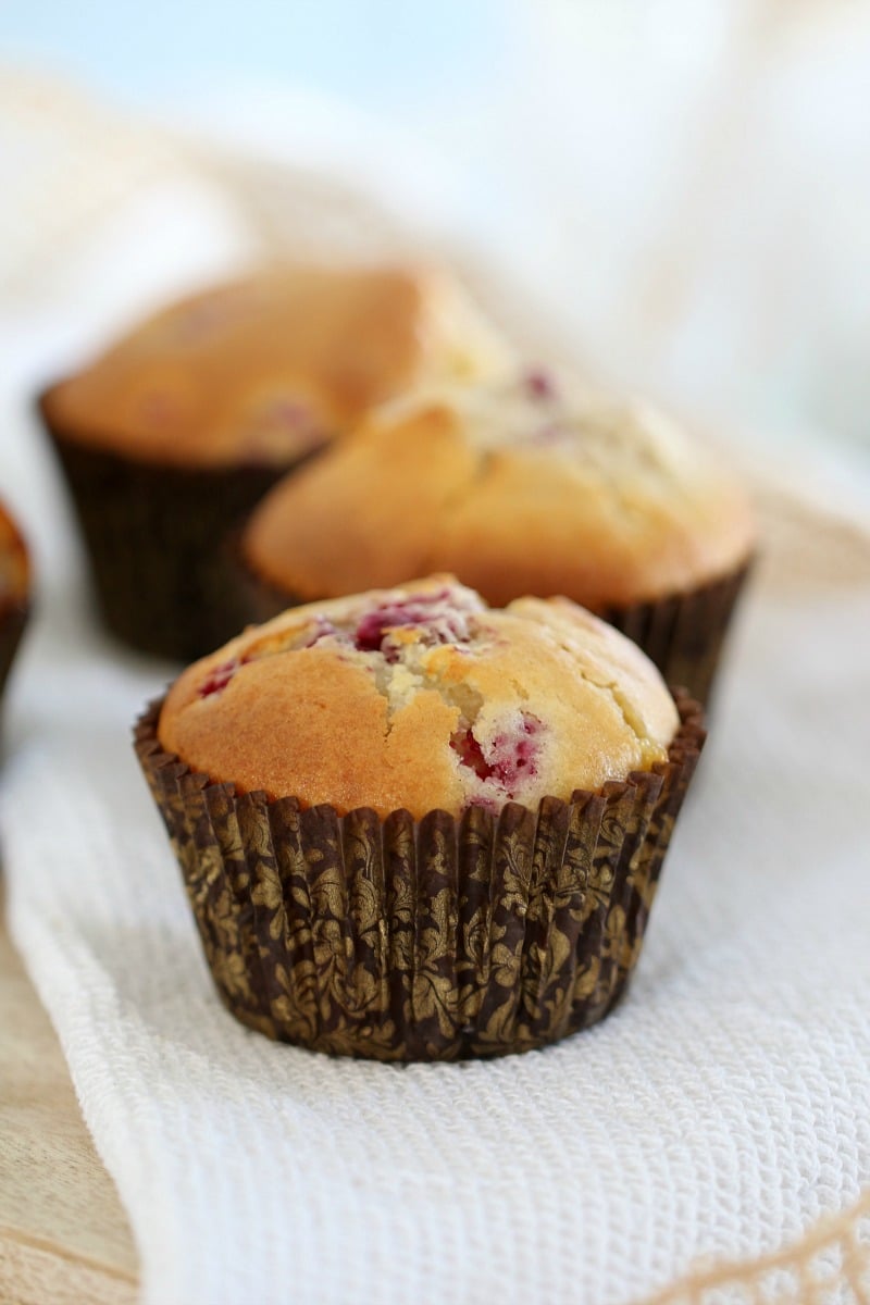 Quick & Easy White Chocolate & Raspberry Muffins - Bake Play Smile